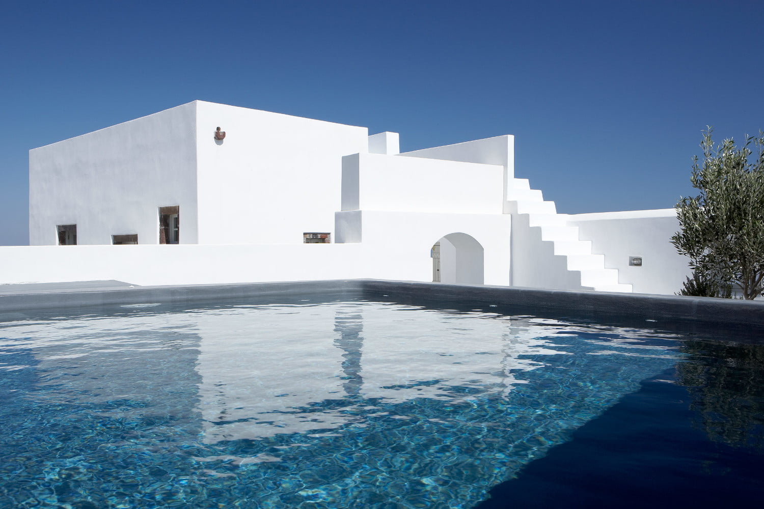 The exterior of the Villa Vinios building, view from the terrace pool area