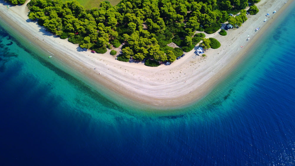Destination North Evia featuring pine forestes all the way to the sandy shores with crystal clear turquoise waters by RentAGreekVilla powered by PathTravelDesigns Greece