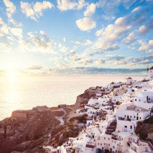9. A-righteous-cause-Free-Santorini-from-its-sunset-fame-Rent-A-Greek-Villa The village of Oia in Sabtorini photographed during autumn with clouds in the sky by Rent A Greek Villa