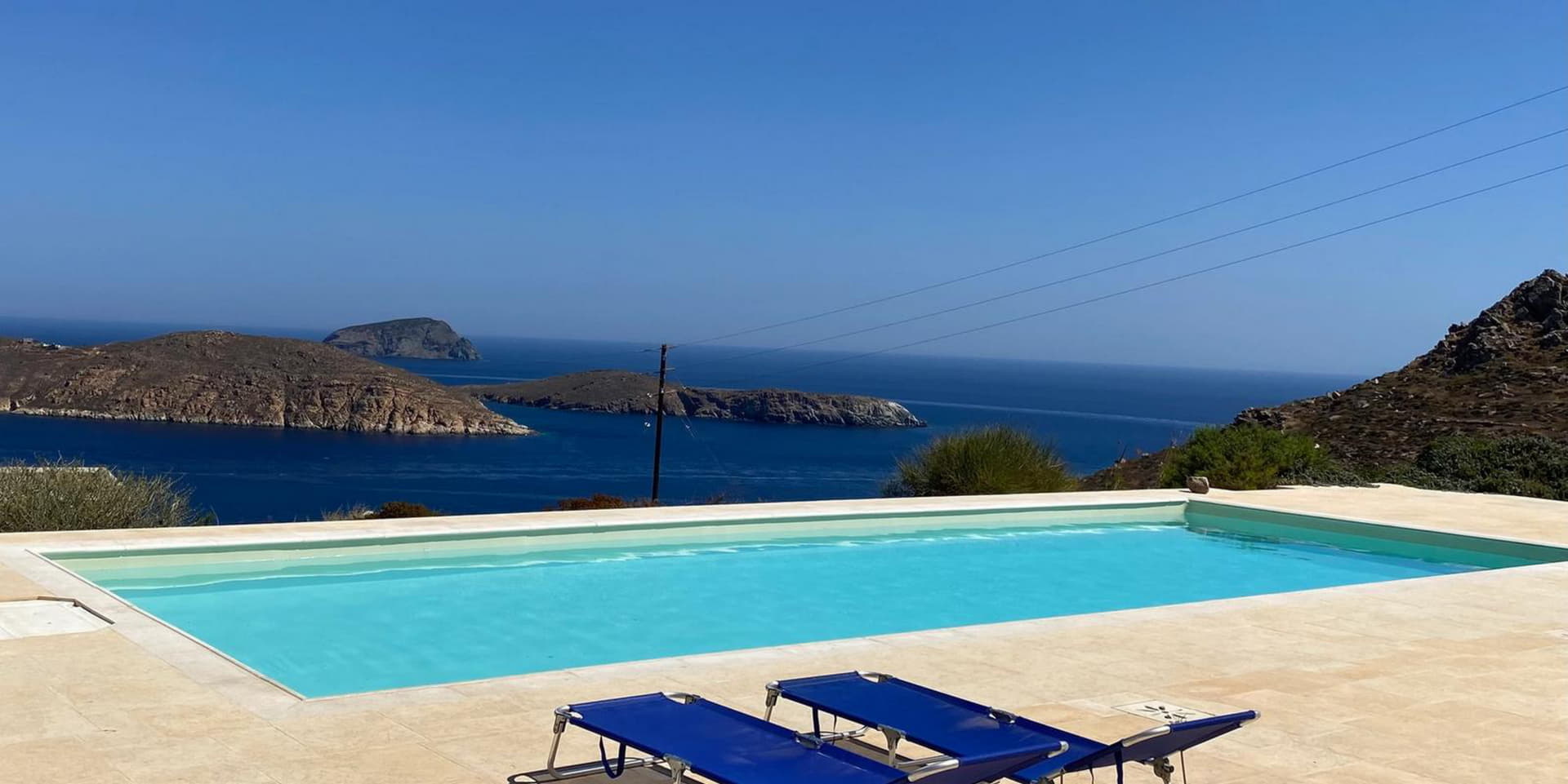 Serifos private villa pool overlooking the Aegean Sea and islets